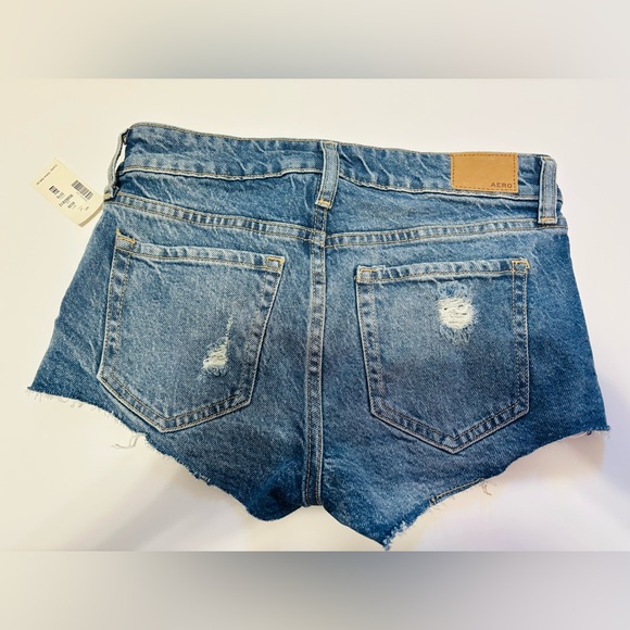 Aeropostale Women's Frayed Distressed Denim Shorts - Blue. Low rise stretch - Picture 2 of 3